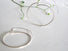 Large fine crafted textured hoops with integrated ear wire design for a natural hang