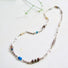A link necklace made of paperclip and rolo silver links,: apatite, tourmaline, black pearls, moonstone, smokey topaz beads