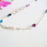 A  16 " Silver paper clip  link necklace studded with 3 mm genuine gemstones: beads of  Sapphires, Rhodolite Garnets, Apatite, Genuine Freshwater Cultured Pearls.
