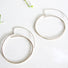 large fine crafted textured silver hoops with integrated ear wire design for a natural hang