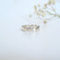 A silver ring made of of hexagon shapes