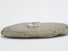A silver band composed of organic silver forms and ribbons of engraved lines that represent  flowing water